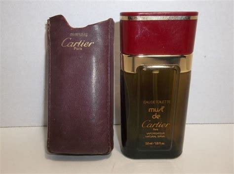 cartier perfume in leather case